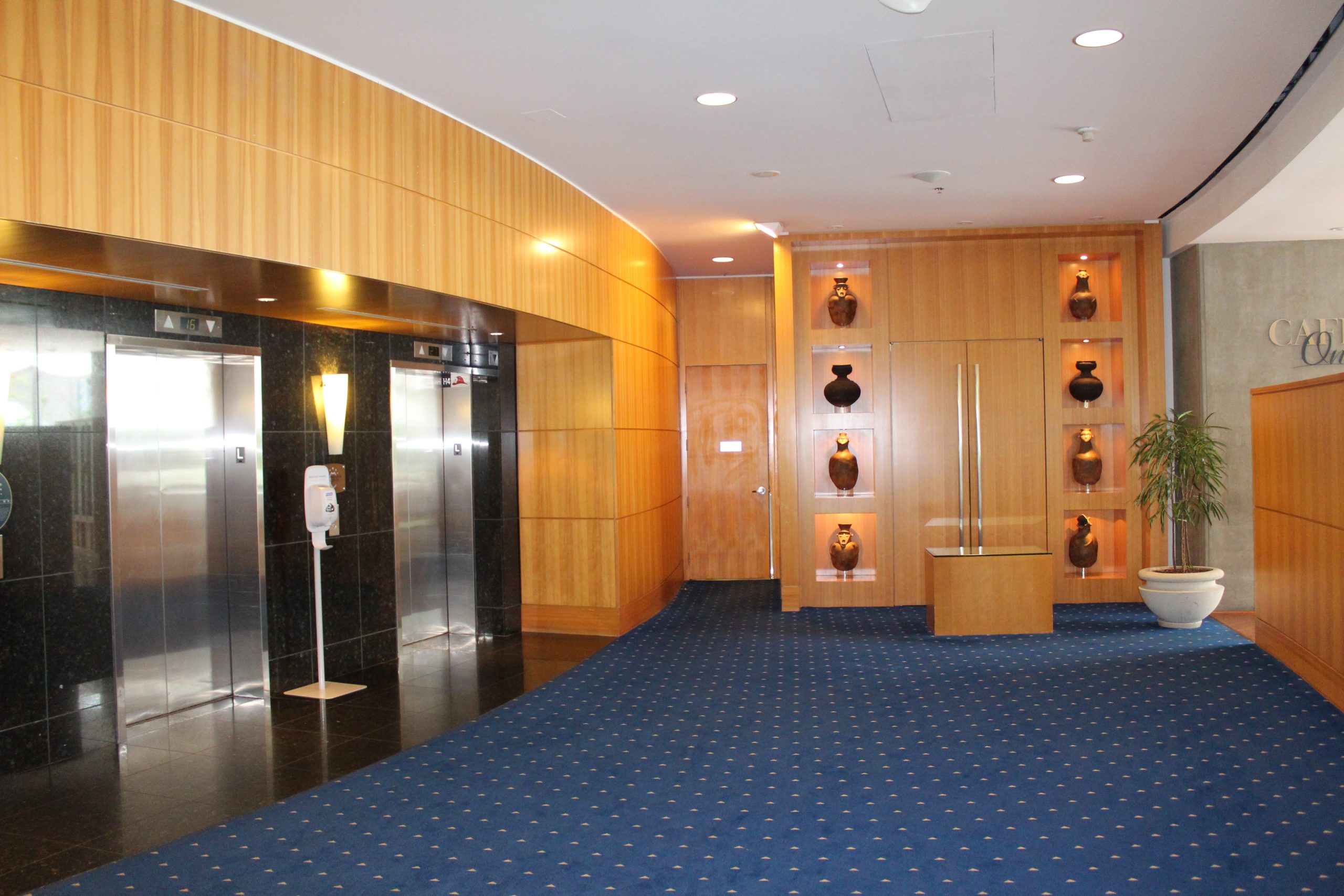 Reception elevators with walls made of pacific HemFir desk and walls